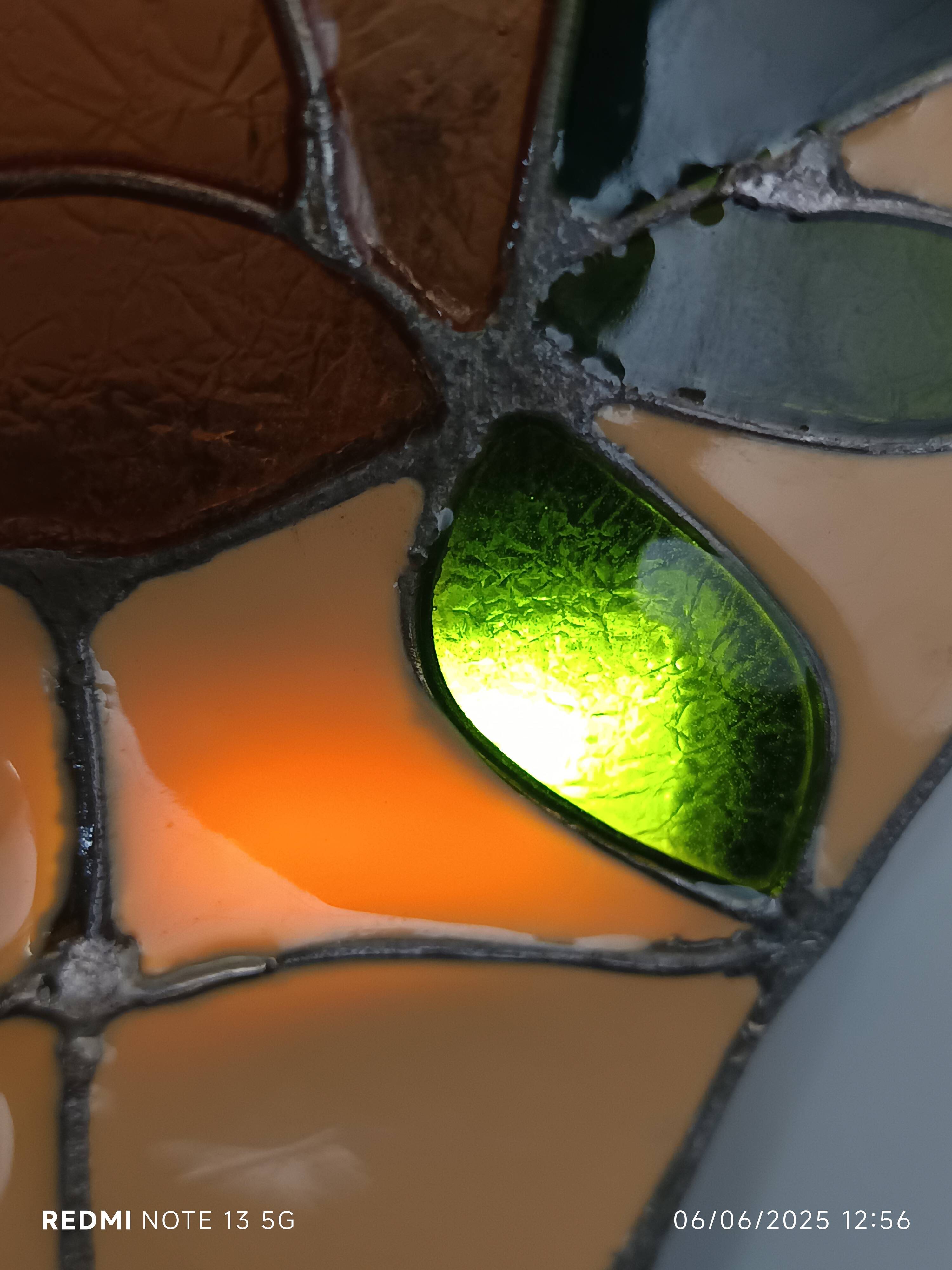 Stained glass and brass wall light from the 1970s