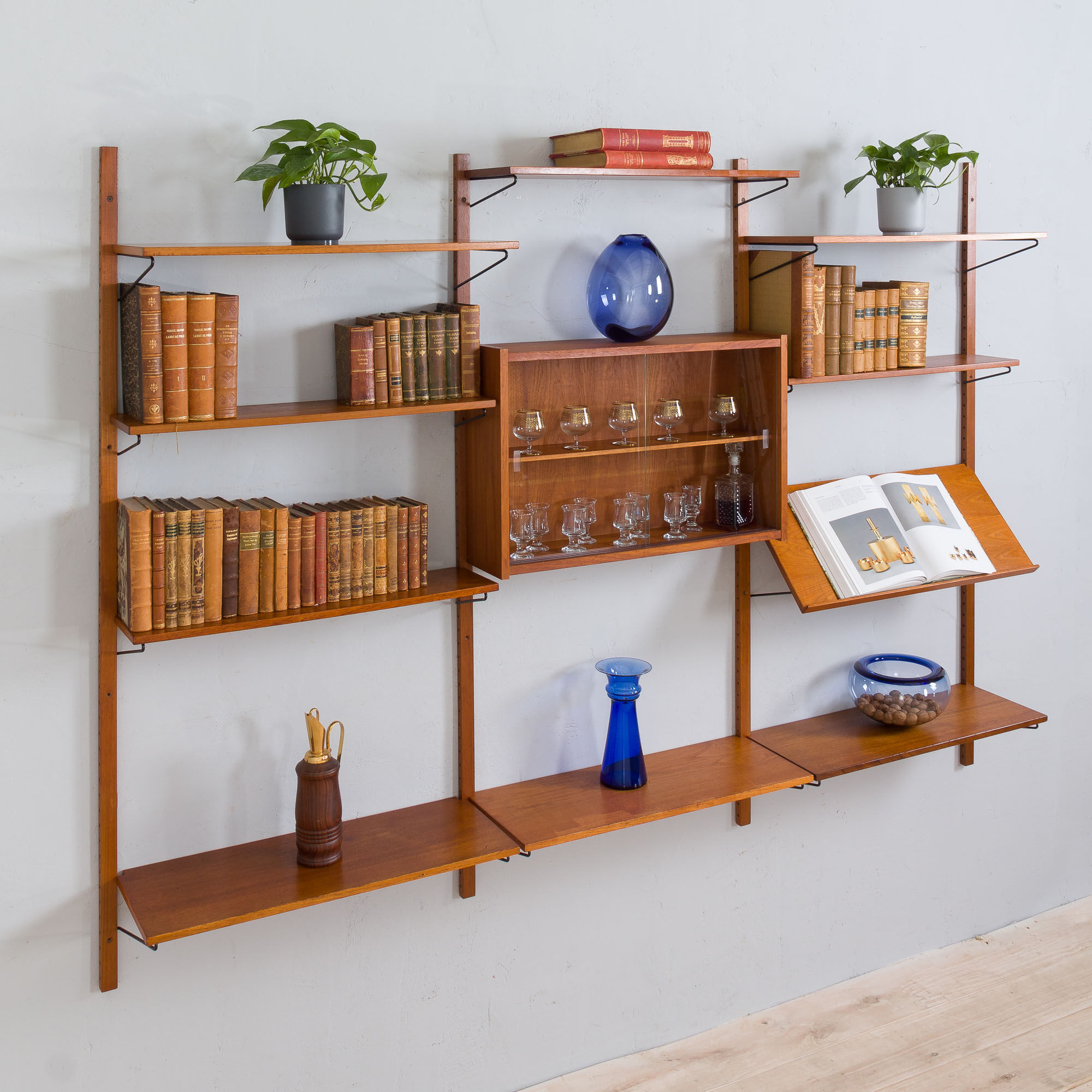 Danish mid century teak wall unit with magazine shelf and glass cabinet 1960/70s