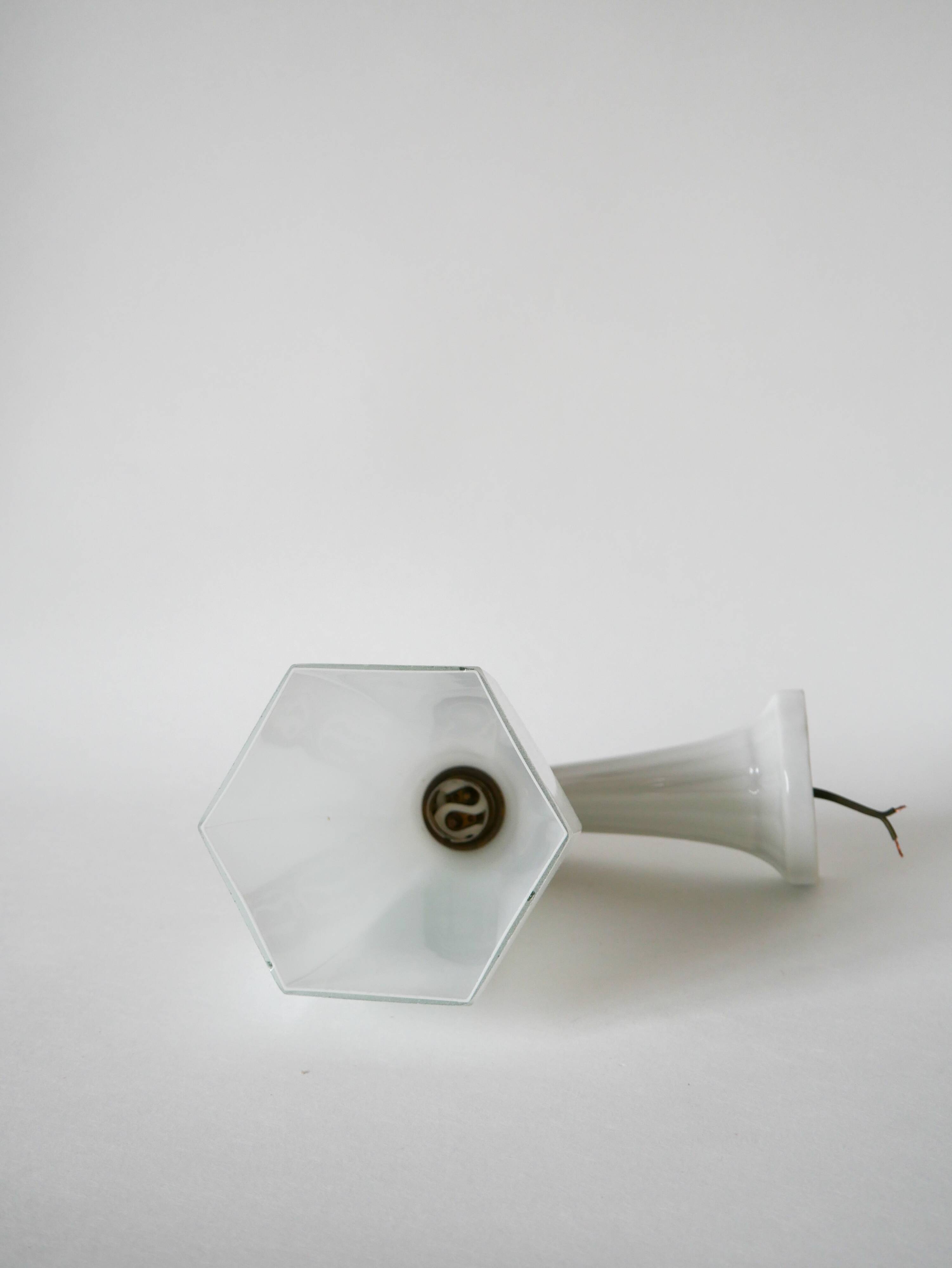 graphic art deco wall light and 20th century porcelain support