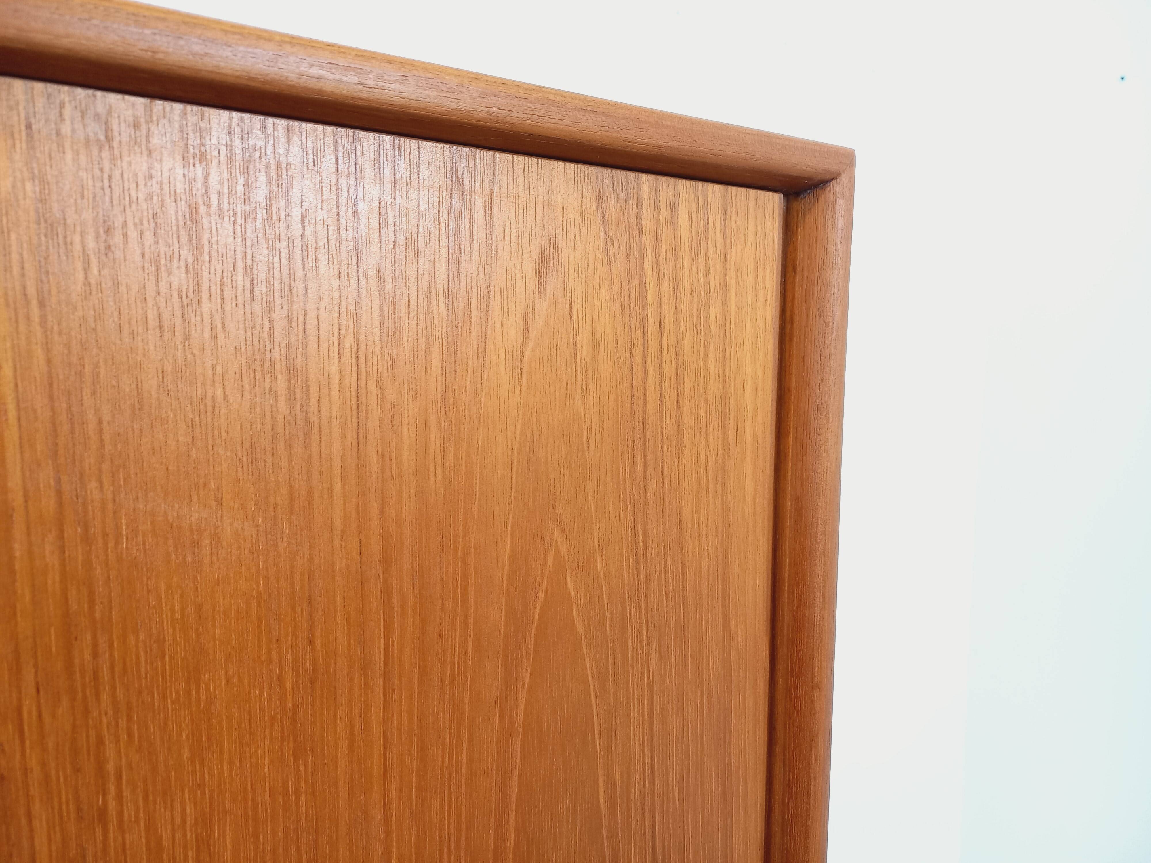 Vintage Scandinavian modernist wardrobe in teak and metal from the 1960s.