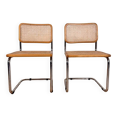 Chairs with a chrome tubular frame and a rattan seat, Italy, 1970s.