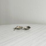 2 light metal shell cups