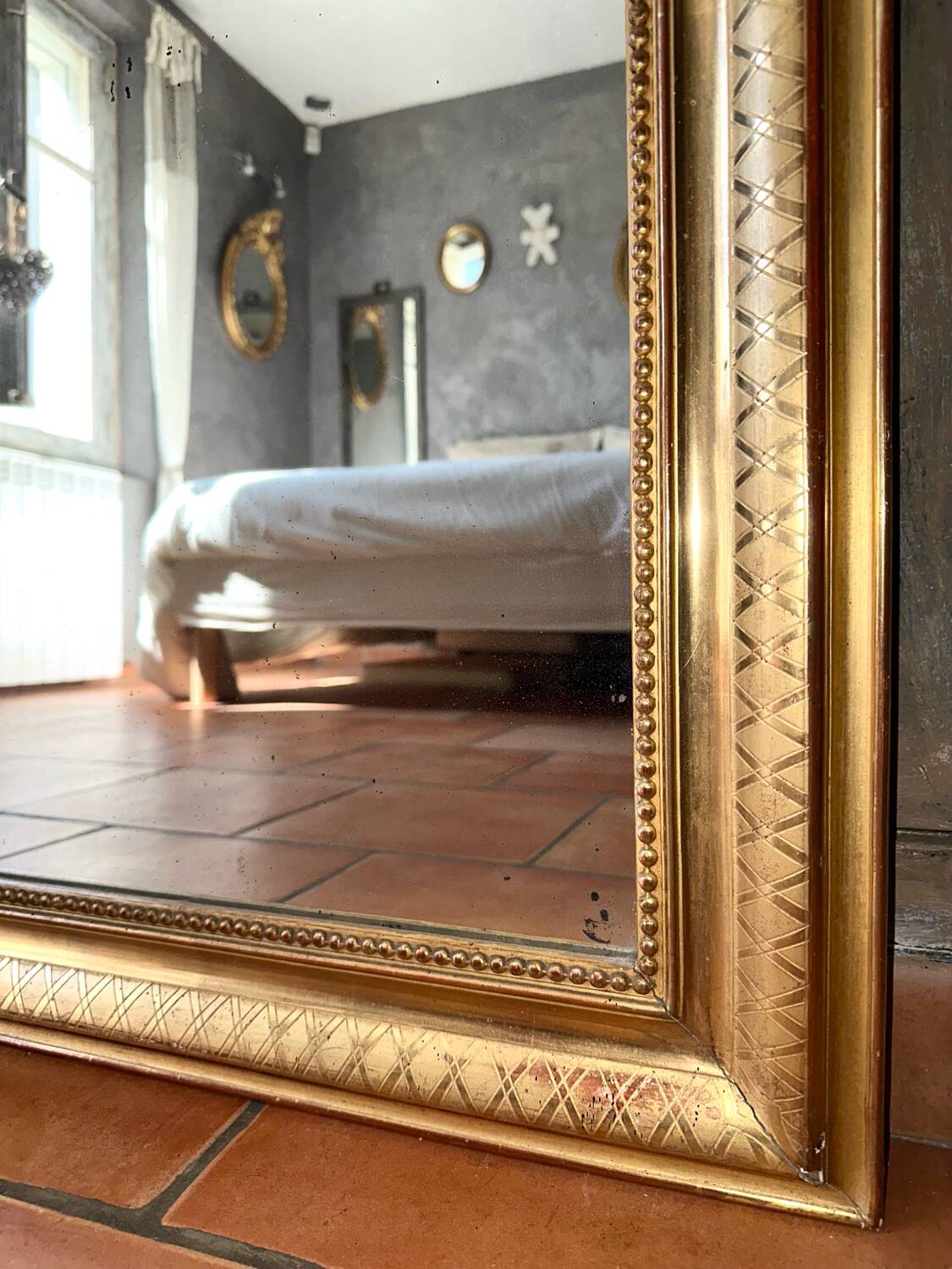 Louis-Philippe antique gilded mirror from the 19th century.