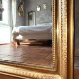 Louis-Philippe antique gilded mirror from the 19th century.
