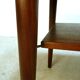 Curved Danish teak coffee table with additional shelf compartment, 1960s