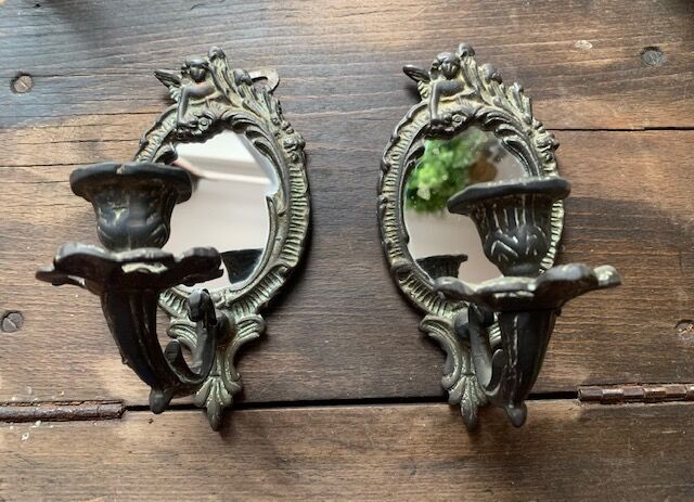 Pair of antique bronze candle holders