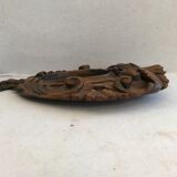 Ancient mirror in carved wood, vintage decoration