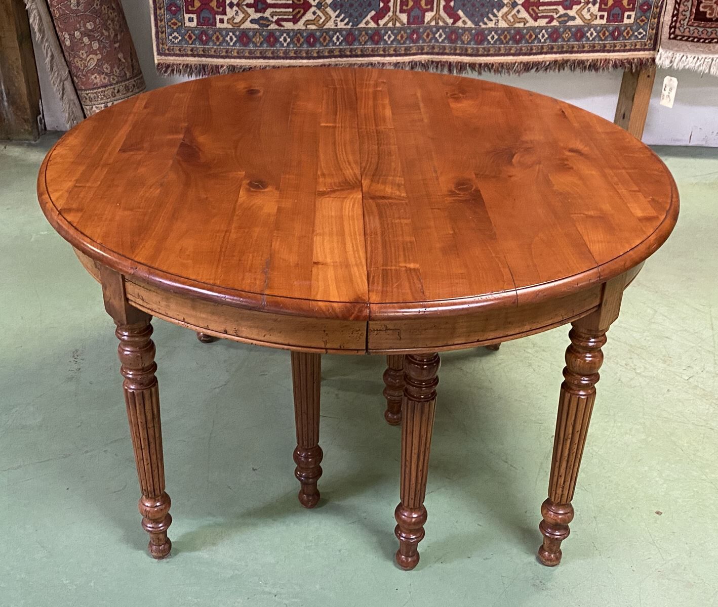 Louis Philippe round table 8 feet in cherry with 6 extensions