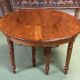 Louis Philippe round table 8 feet in cherry with 6 extensions