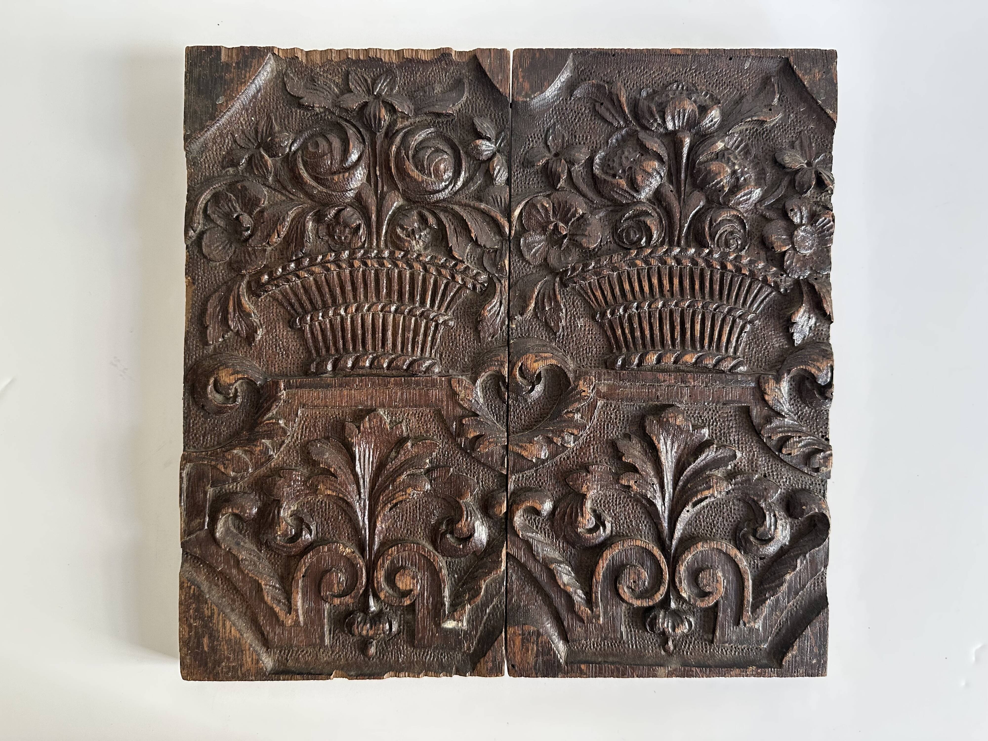 Pair of antique decorative panels in carved wood, 19th century