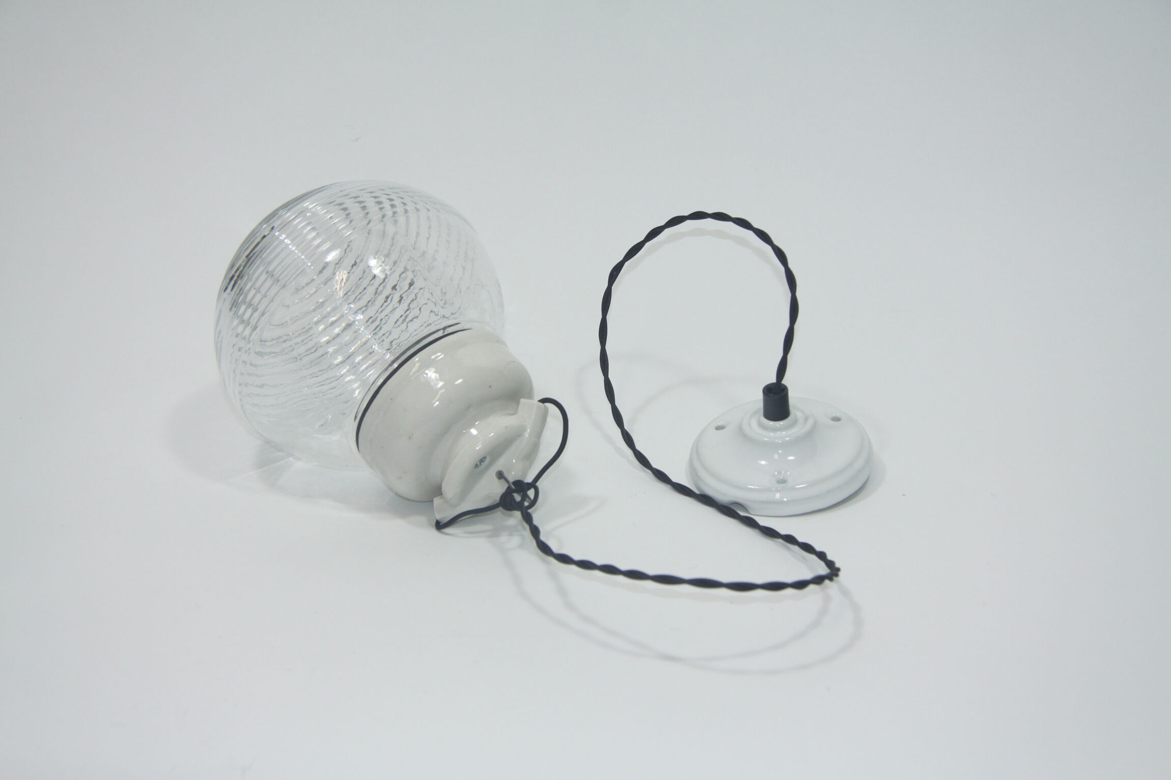 Porcelain lamp with a glass shade