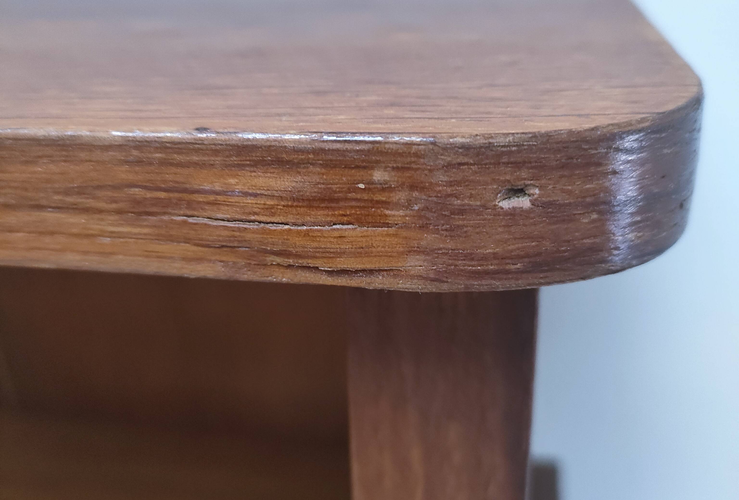 vintage wooden bedside table with crossbars and tapered legs