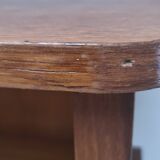 vintage wooden bedside table with crossbars and tapered legs