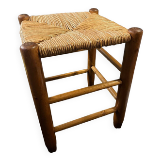 Wooden stool with straw seat