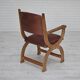 Années 1950, design danois, fauteuil retapissé, cuir marron naturel, bois de chêne.