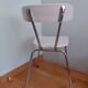 Chrome metal chair and formica white striped gray