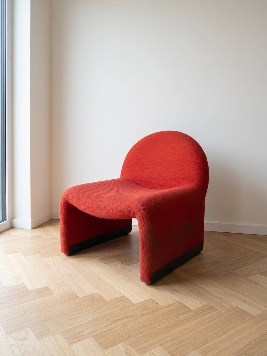 Pair of vintage armchairs from the 70s in red fabric.