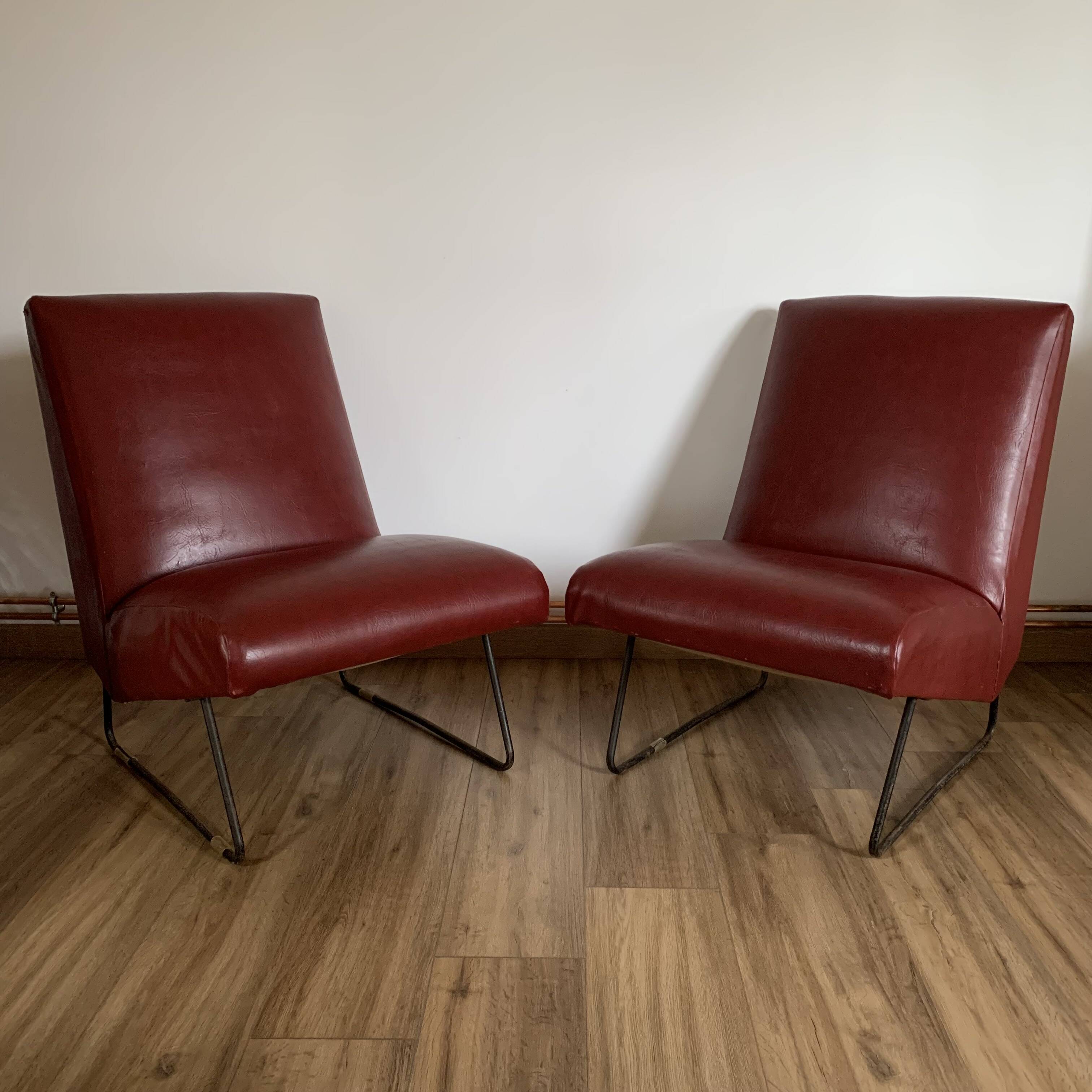 Pair of vintage burgundy red armchairs