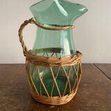 Glass pitcher and wicker