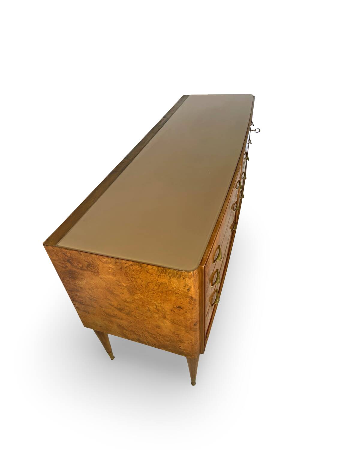 Veneered burl walnut chest of drawers with light warm brown glass top