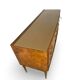 Veneered burl walnut chest of drawers with light warm brown glass top