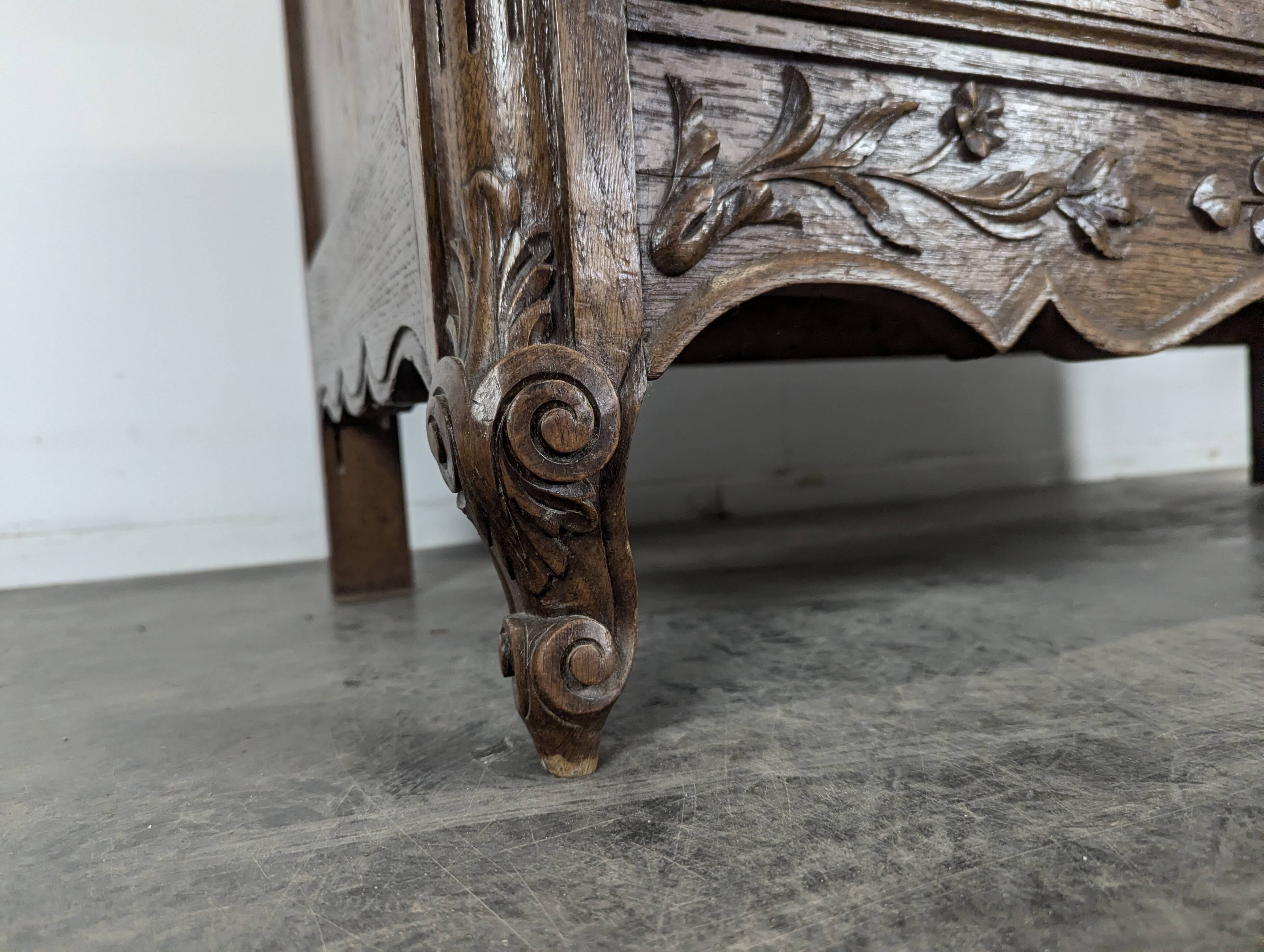 Carved neo-rustic commode in Norman style