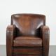 Beautifully shaped vintage sheepskin armchair with character
