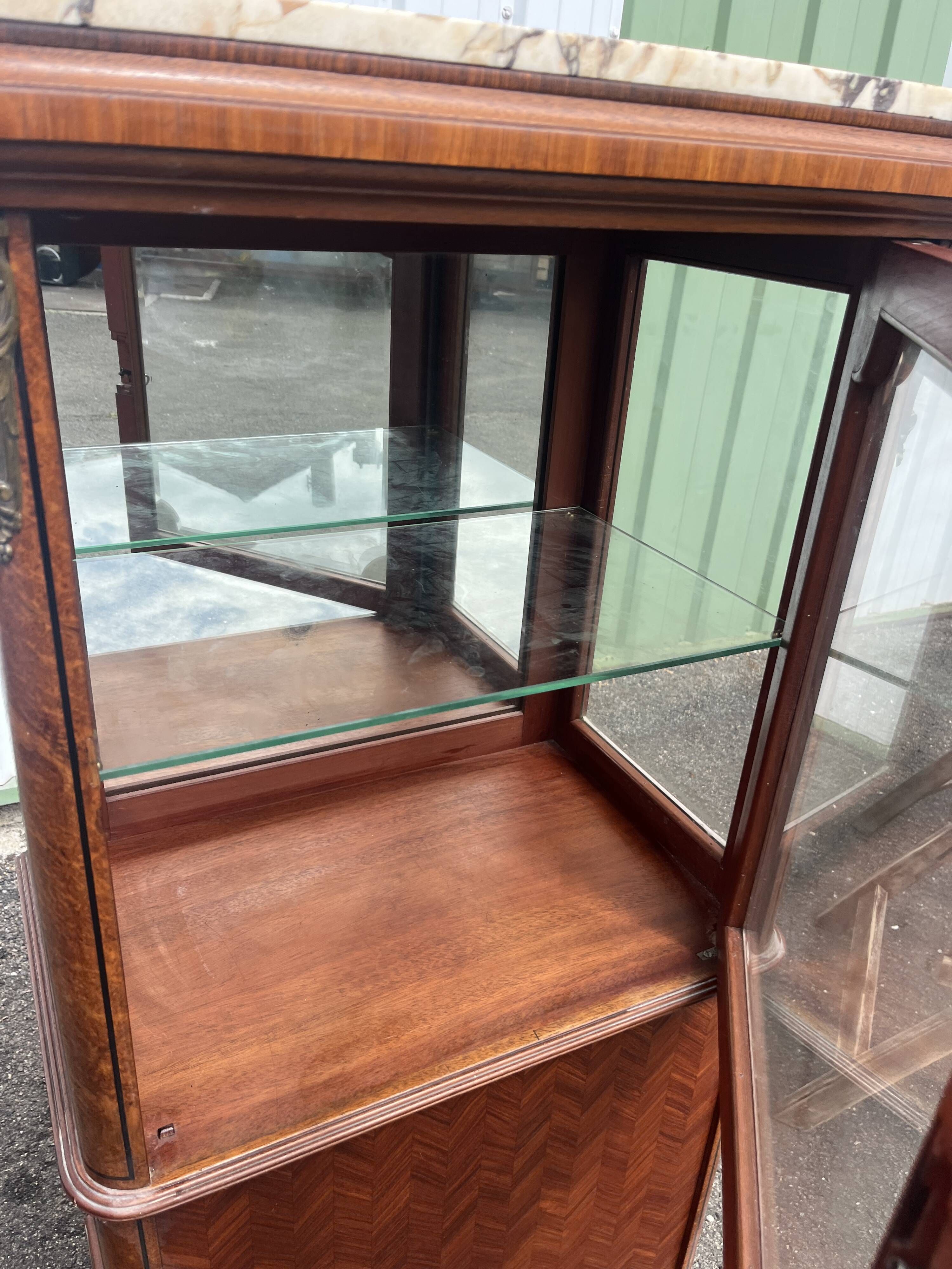Louis XVI style display cabinet, 19th century, marble and gilded bronzes.