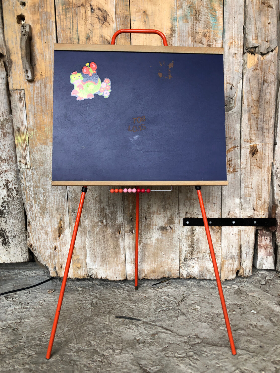 Old school board collapsible orange tube