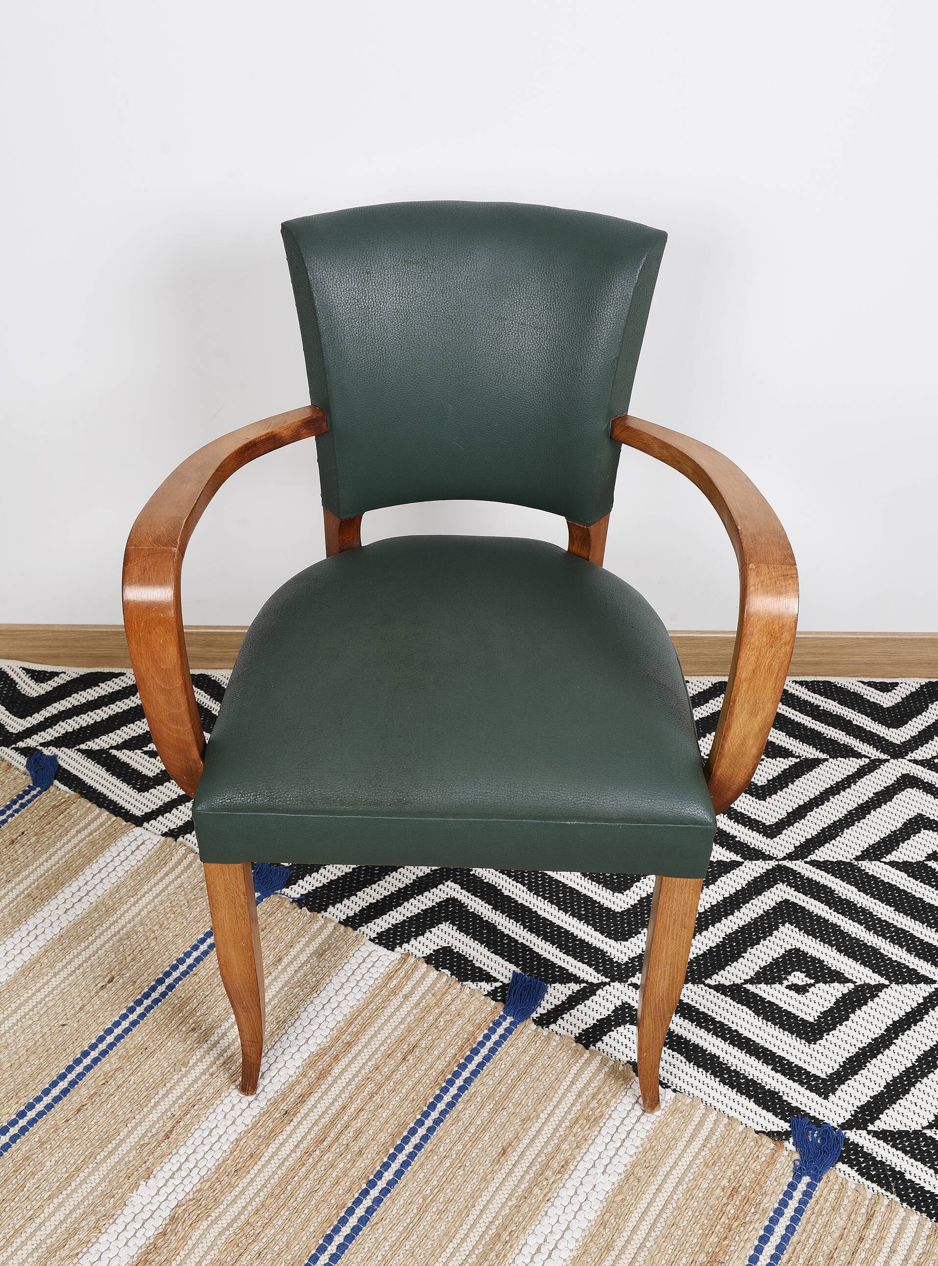 Bridge armchair in green moleskin
