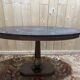 Oval Empire-style gueridon in walnut and marble.