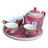 théière chinoise mu shou rose et ses tasses sur un plateau.