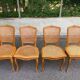 4 Louis XV dining chairs in light solid wood with caning.