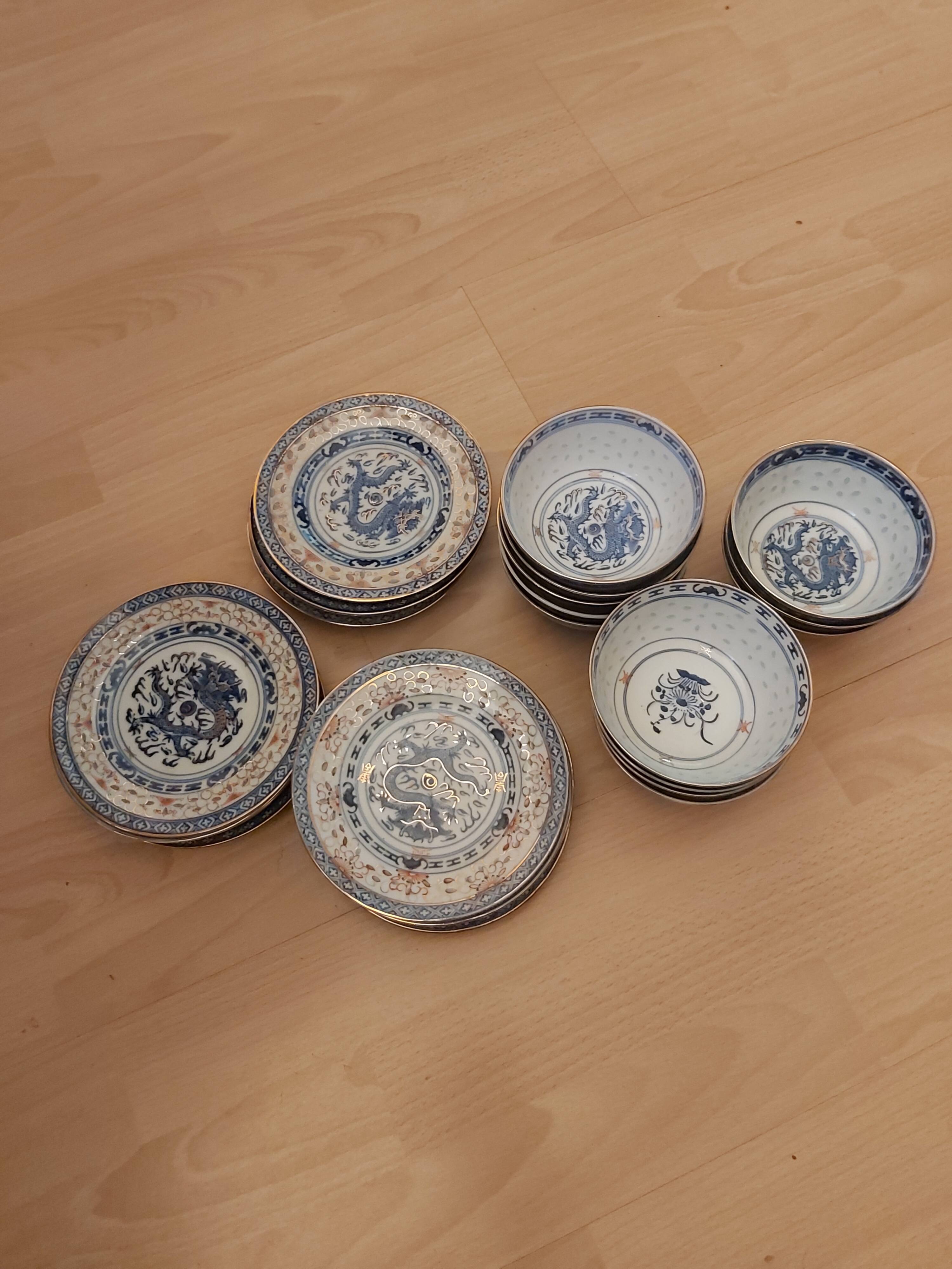 Service of 12 bowls and 12 under dishes in Chinese porcelain called rice seed of the 1960s