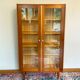 70s glass-fronted bookcase