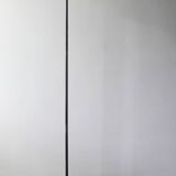 Adjustable floor lamp, minimalist style.