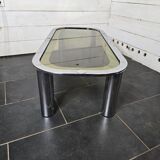 Designer coffee table in chromed metal with smoked glass top