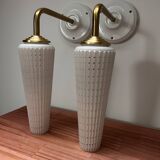Pair of white and gold wall sconces