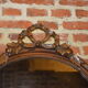 Oval mirror with a node