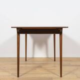 Extendable teak dining table in Mid-Century style from McIntosh, UK.