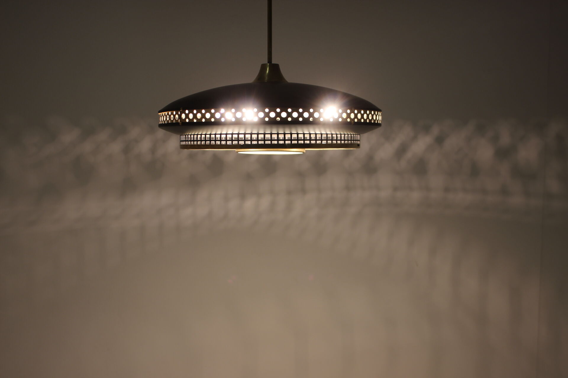 1960s black and gold UFO pendant , Czechoslovakia