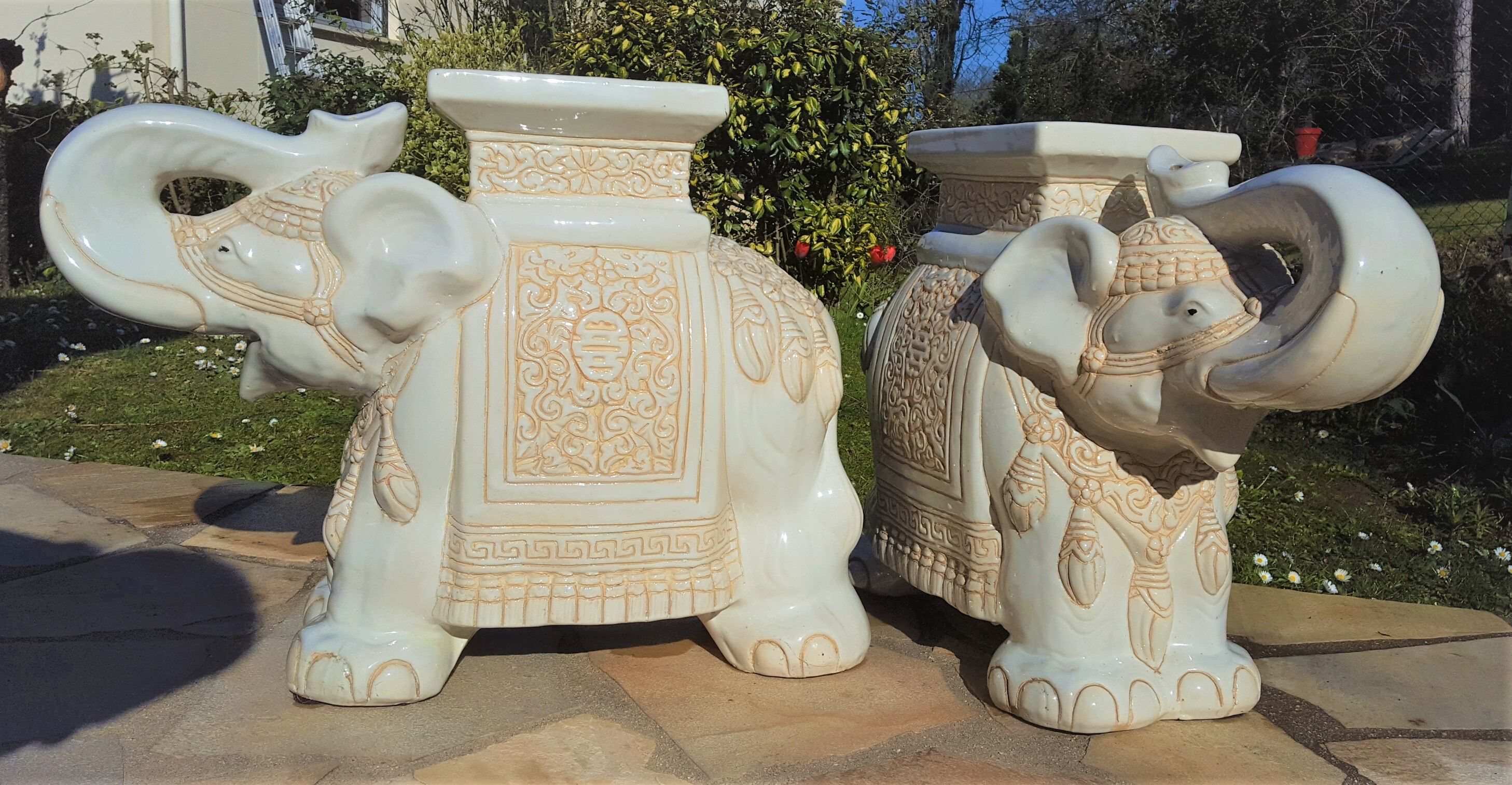 Pair of enamelled white ceramic elephant harnesses