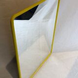 1970s mirror yellow plastic frame