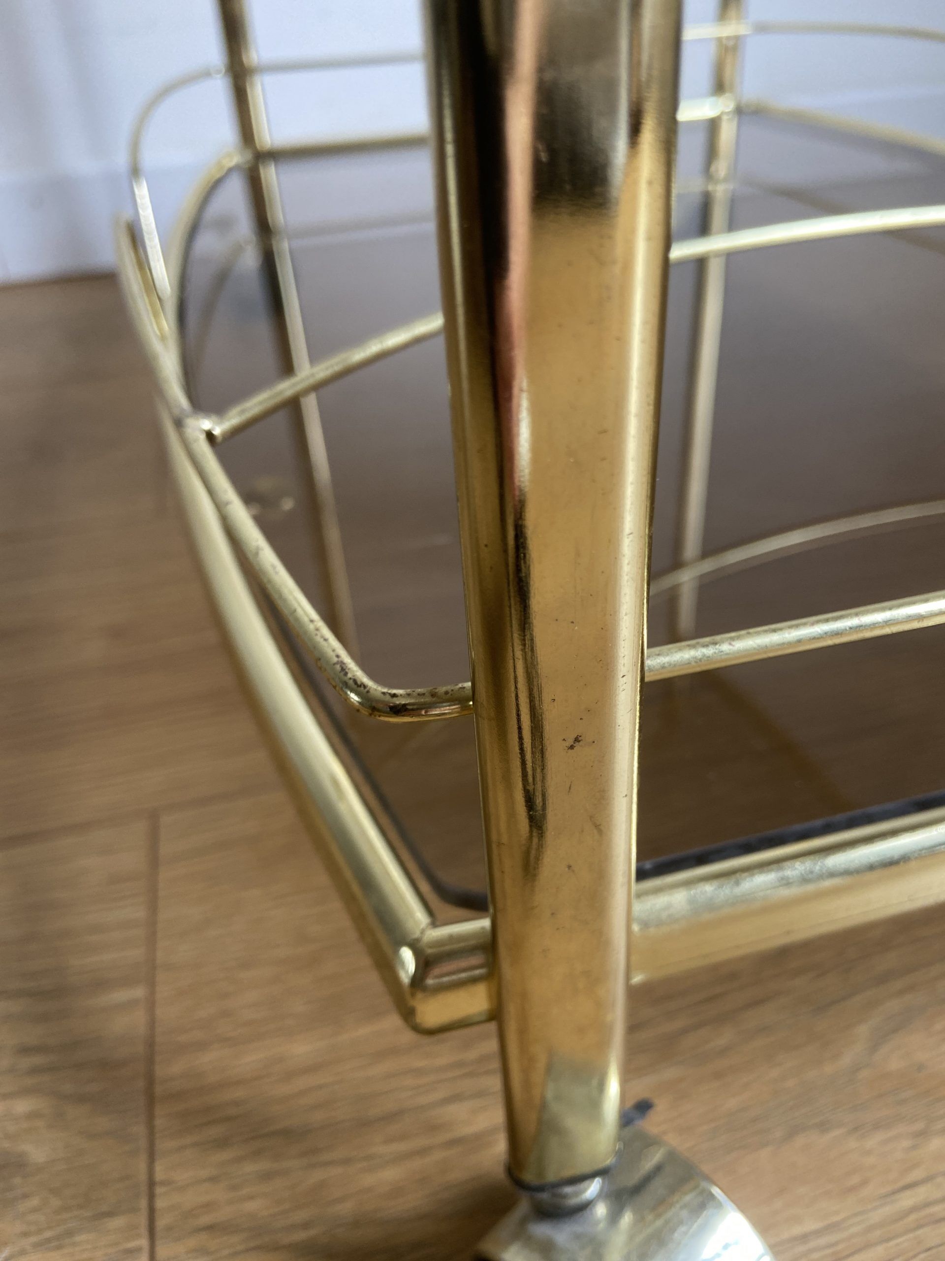 Vintage rolling service in gilded metal and smoked glass