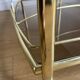 Vintage rolling service in gilded metal and smoked glass
