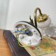 Swan neck wall light in brass with glass tulip.