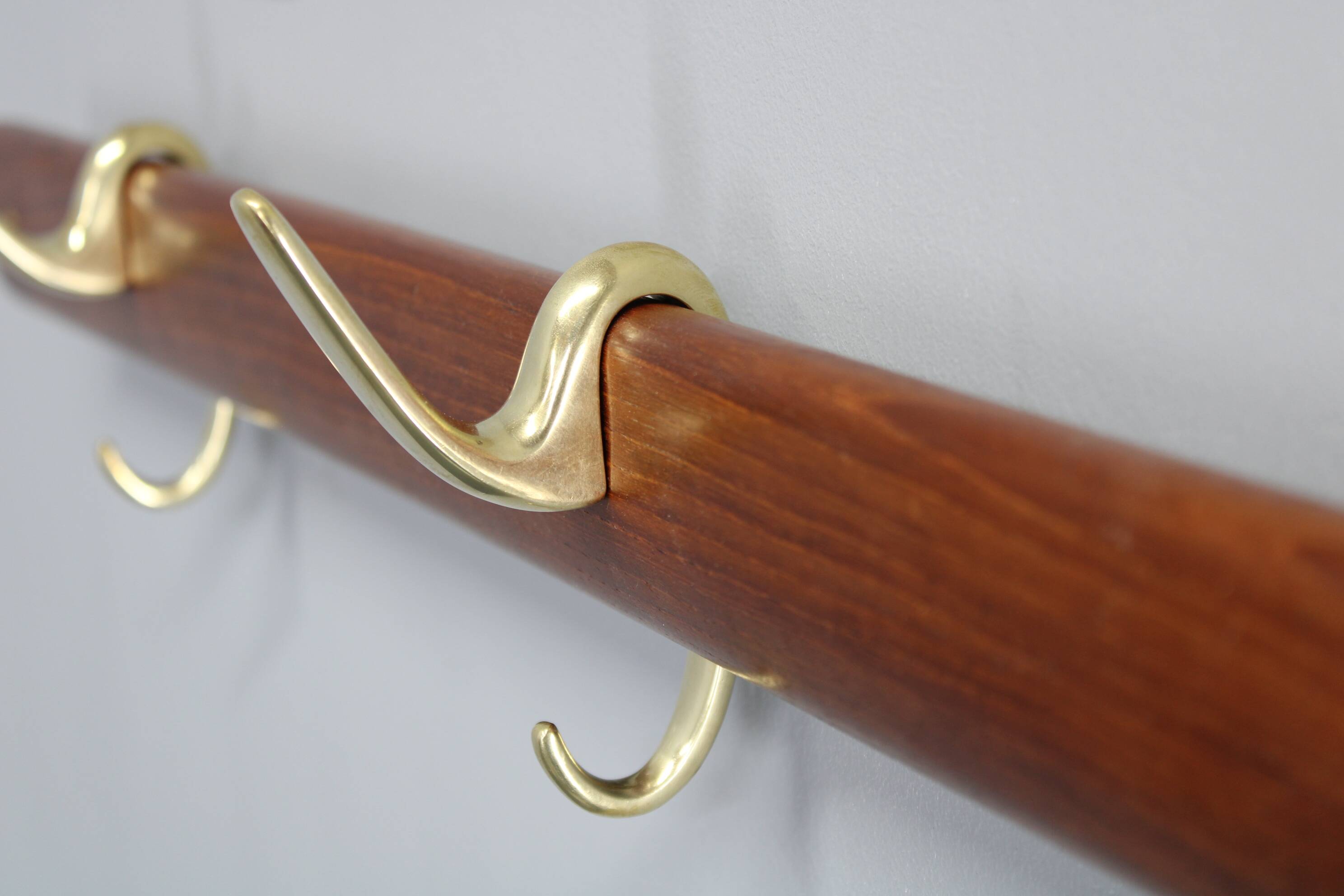 Brass and teak coat hanger by Carl Auböck for Illums Bolighus, Denmark, 1950s