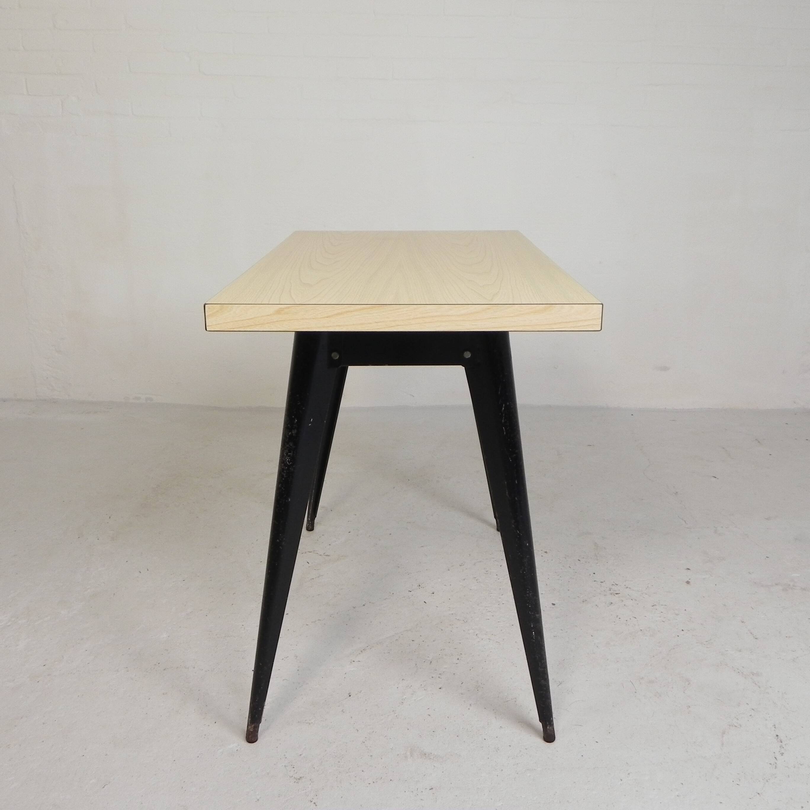 Bistro table Henri Julien, model Tolix T55 with a Formica top, 1950s.