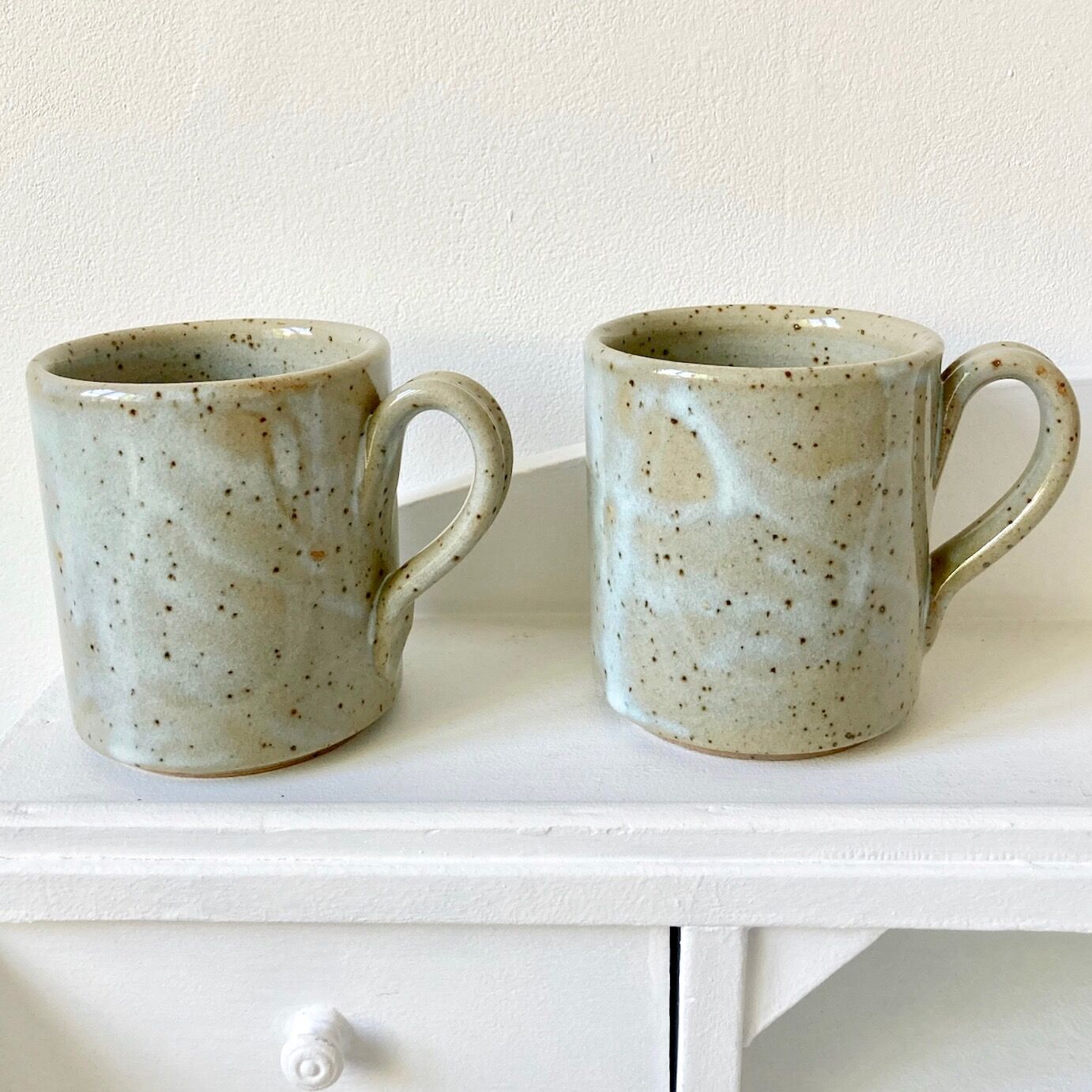 Pair of enamelled stoneware mugs