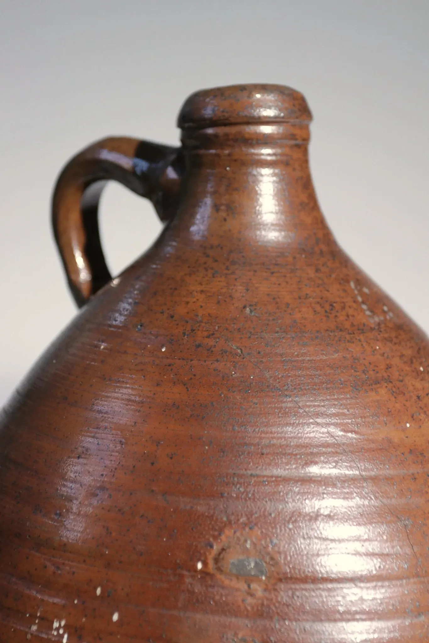 Brown stoneware jug with handle – 19th century
